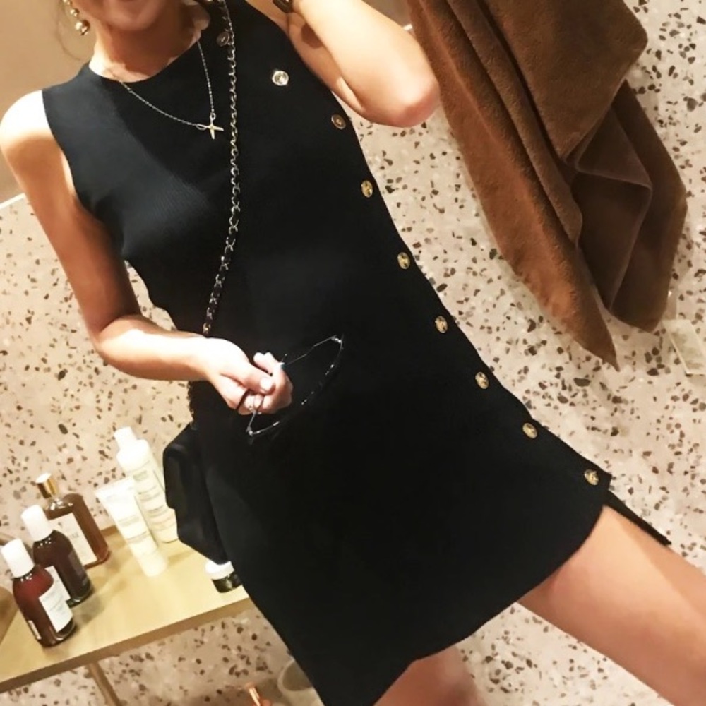 Chic Sleeveless Black Mini Dress with Gold Button Trim